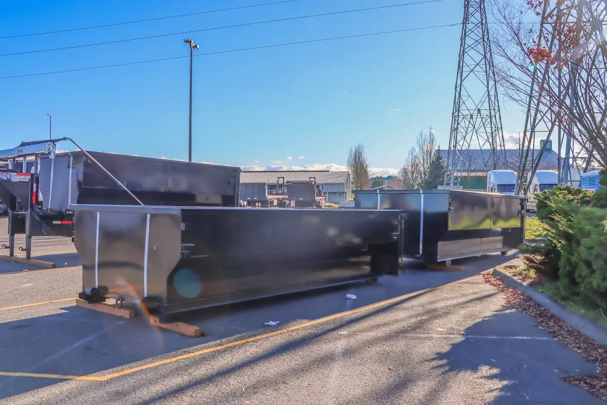 Roll-off dumpster ready for waste disposal at job site for 15 Yard Dumpster Rental in Springfield